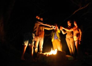 friends enjoying campfire, photo by Drew Farwell